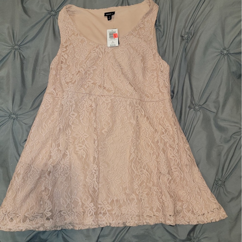 New with tag. Torrid pink lace dress with under dresss news’s size 1